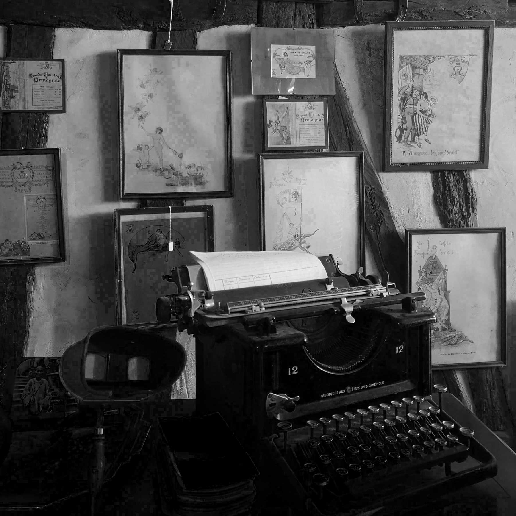 black and white photo of writing machine